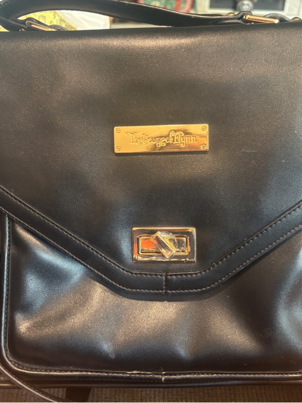 Black House of Flynn Leather Tote with Gold Accents